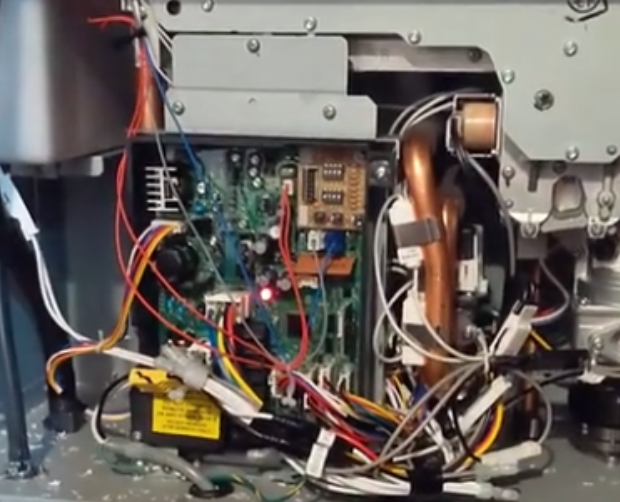 An image of a PC Board inside a Rheem tankless water heater.